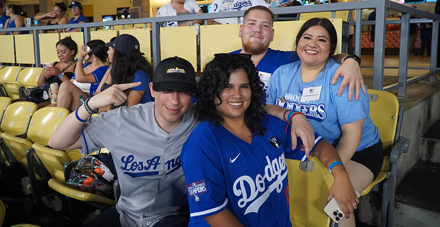 UC Merced alumni pose for a photo at Dodger Stadium.