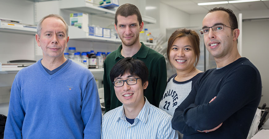 Professor Munoz and a few of his research group members.