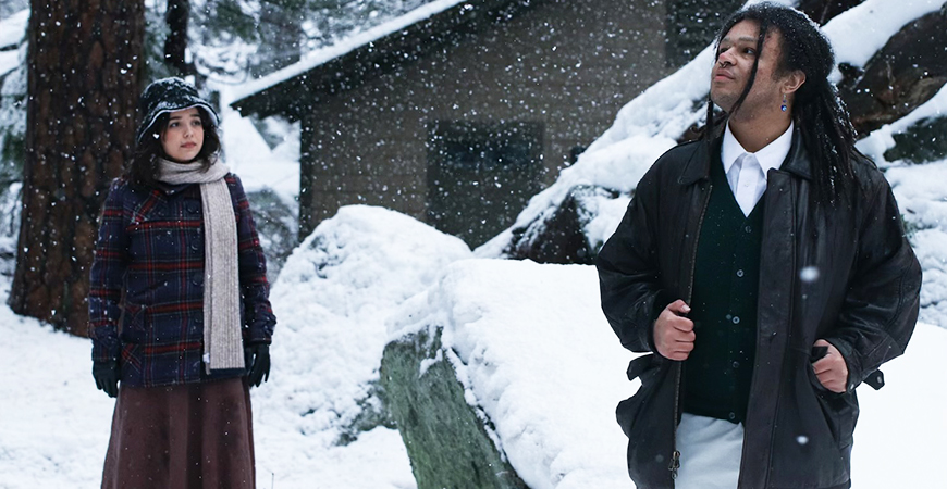 Two people are seen in the snow in Yosemite National Park.